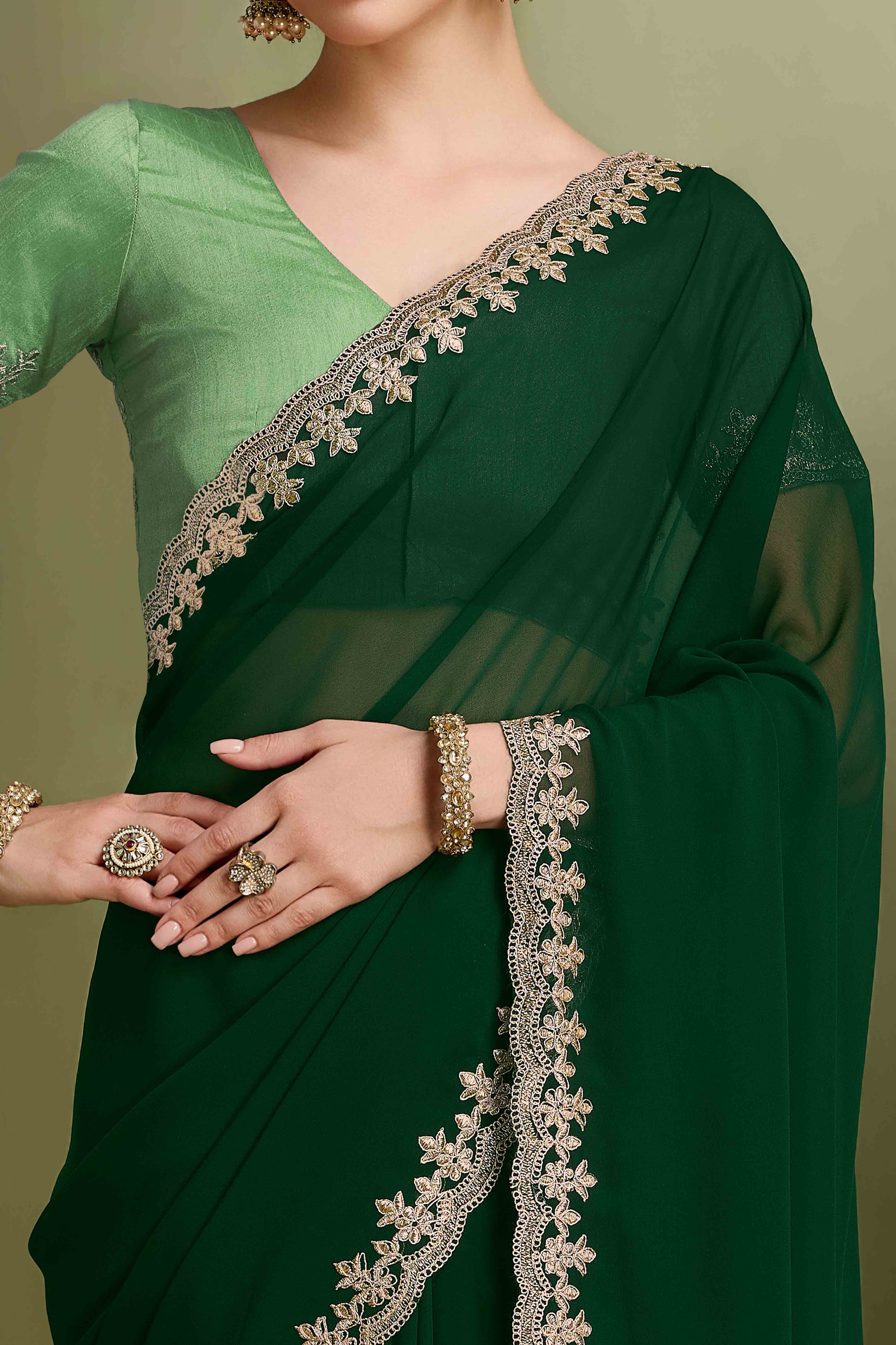 Green Solid With Zari Embroidered Georgette Saree