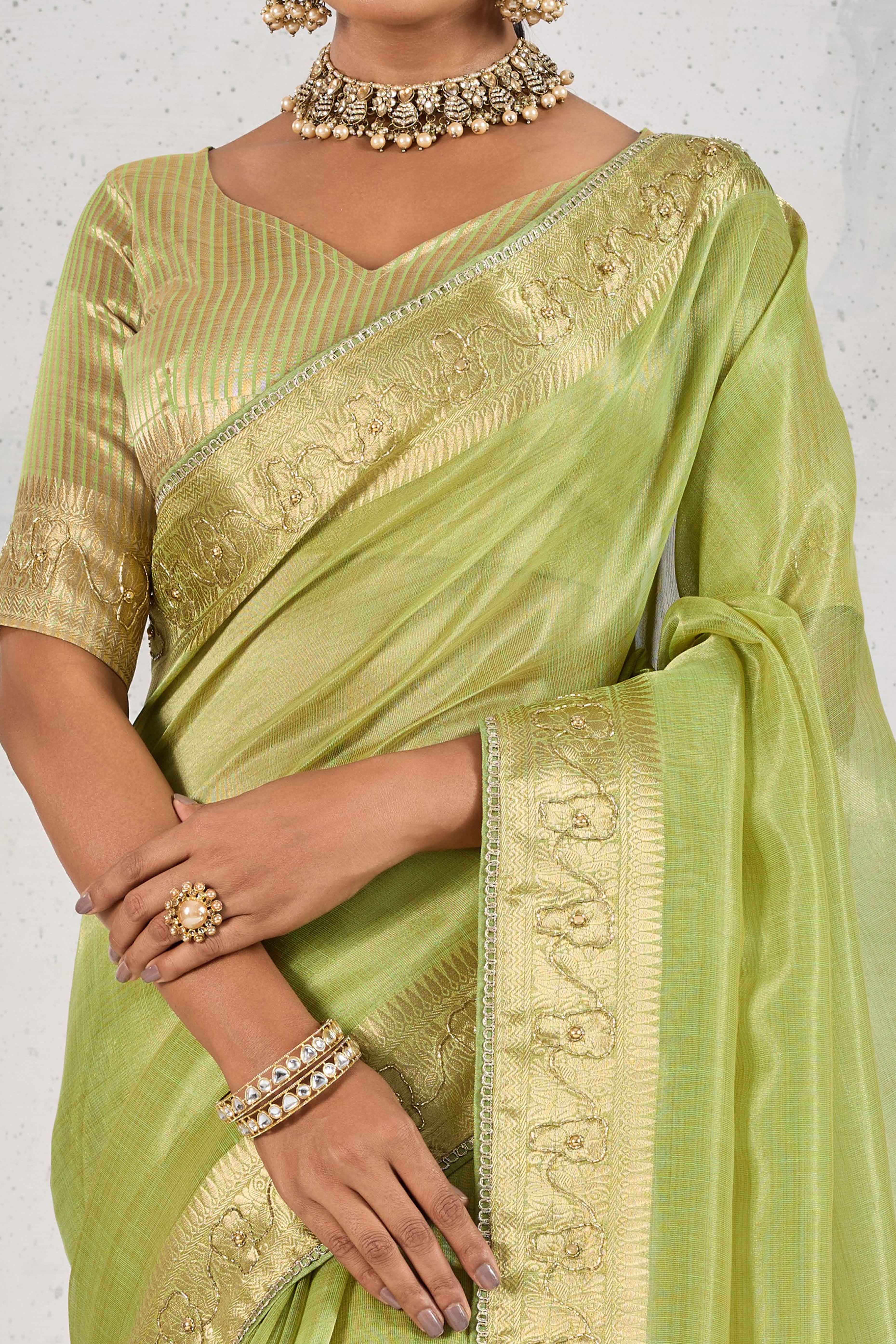 Green Tissue Linen Saree Adorned With Intricate Zardosi & Pearl Cutdana Hand Embroidery