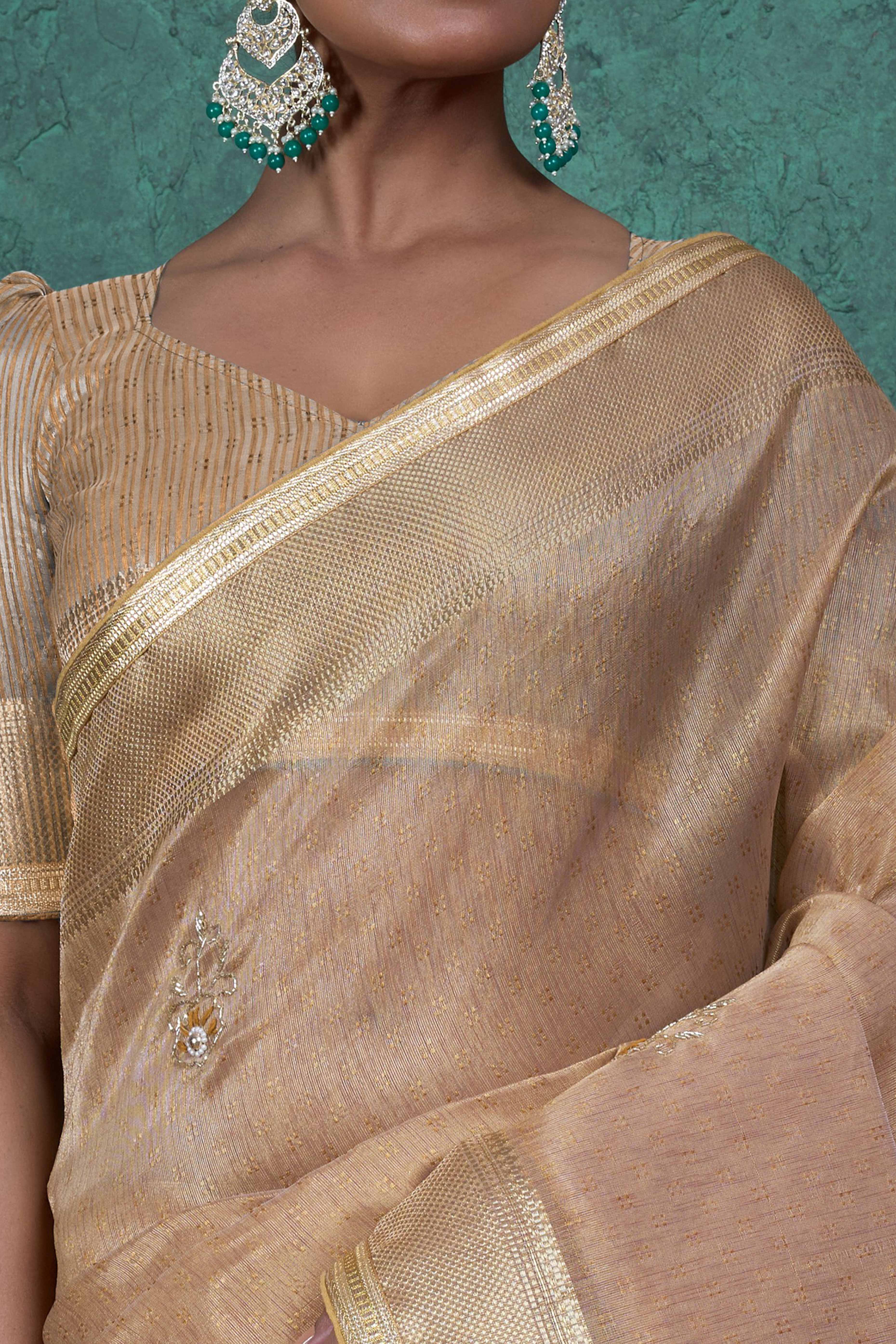 Beige Woven Linen Tissue Saree Featuring Beads Embellishment