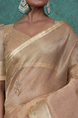 Beige Woven Linen Tissue Saree Featuring Beads Embellishment