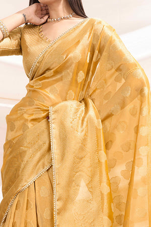 Mustard Floral Woven Tissue Silk Saree With Pearl Lace & Designer Tassels