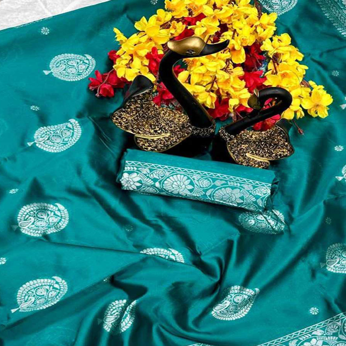 Elegant Teal Floral Zari Woven Lichi Banarasi Silk Saree With Rich Detailing
