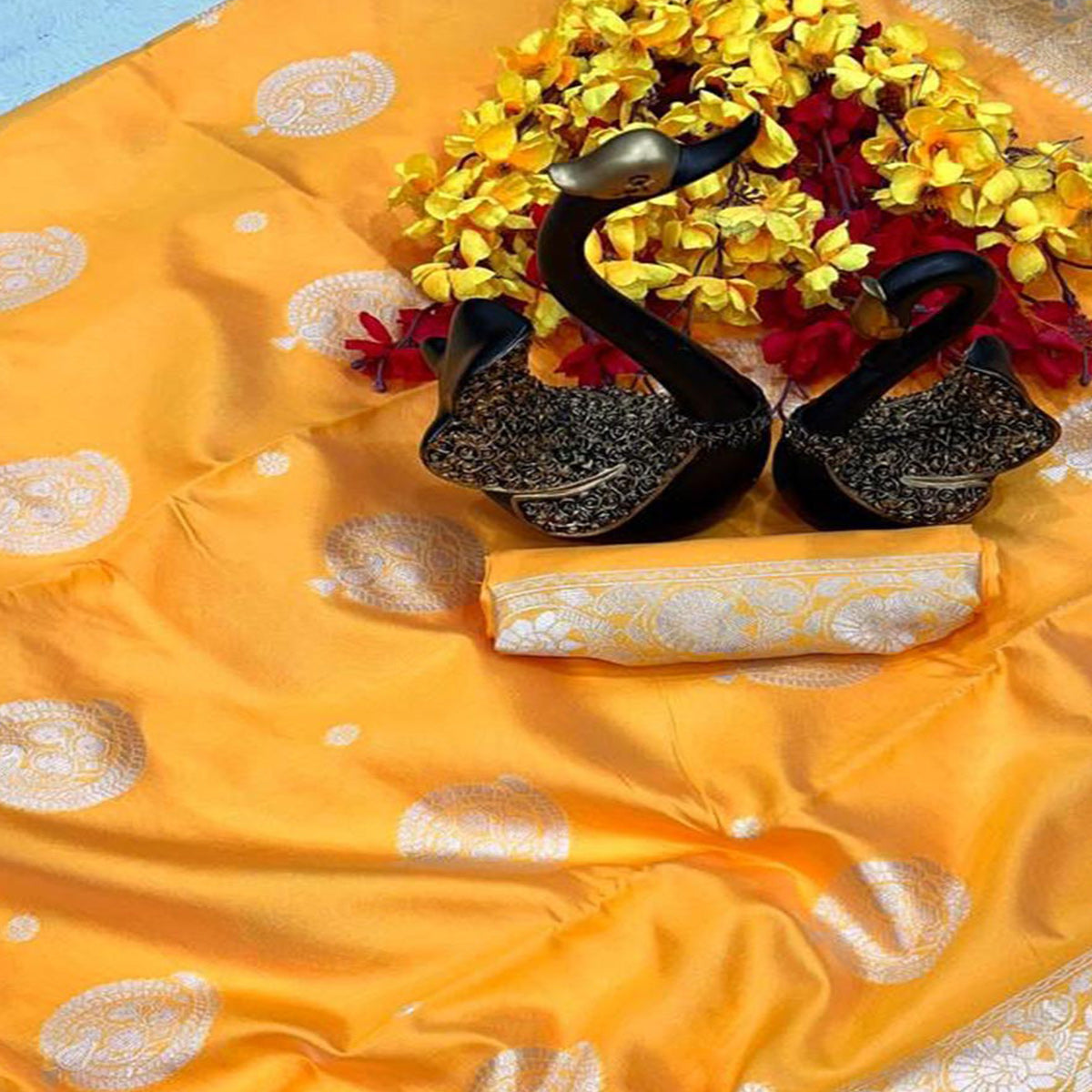 Vibrant Yellow Floral Zari Woven Lichi Banarasi Silk Saree With Rich Detailing