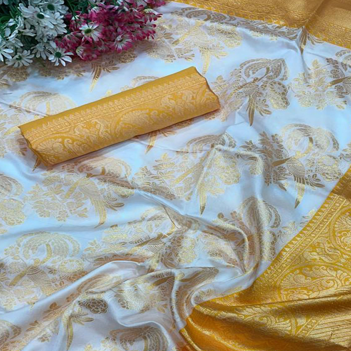 Charming White & Yellow Floral Zari Woven Lichi Banarasi Silk Saree