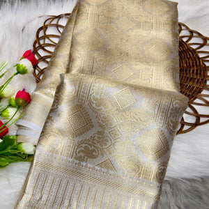 Handloom Banarasi Golden Tissue Silk Saree Adorned with Intricate Traditional Patterns