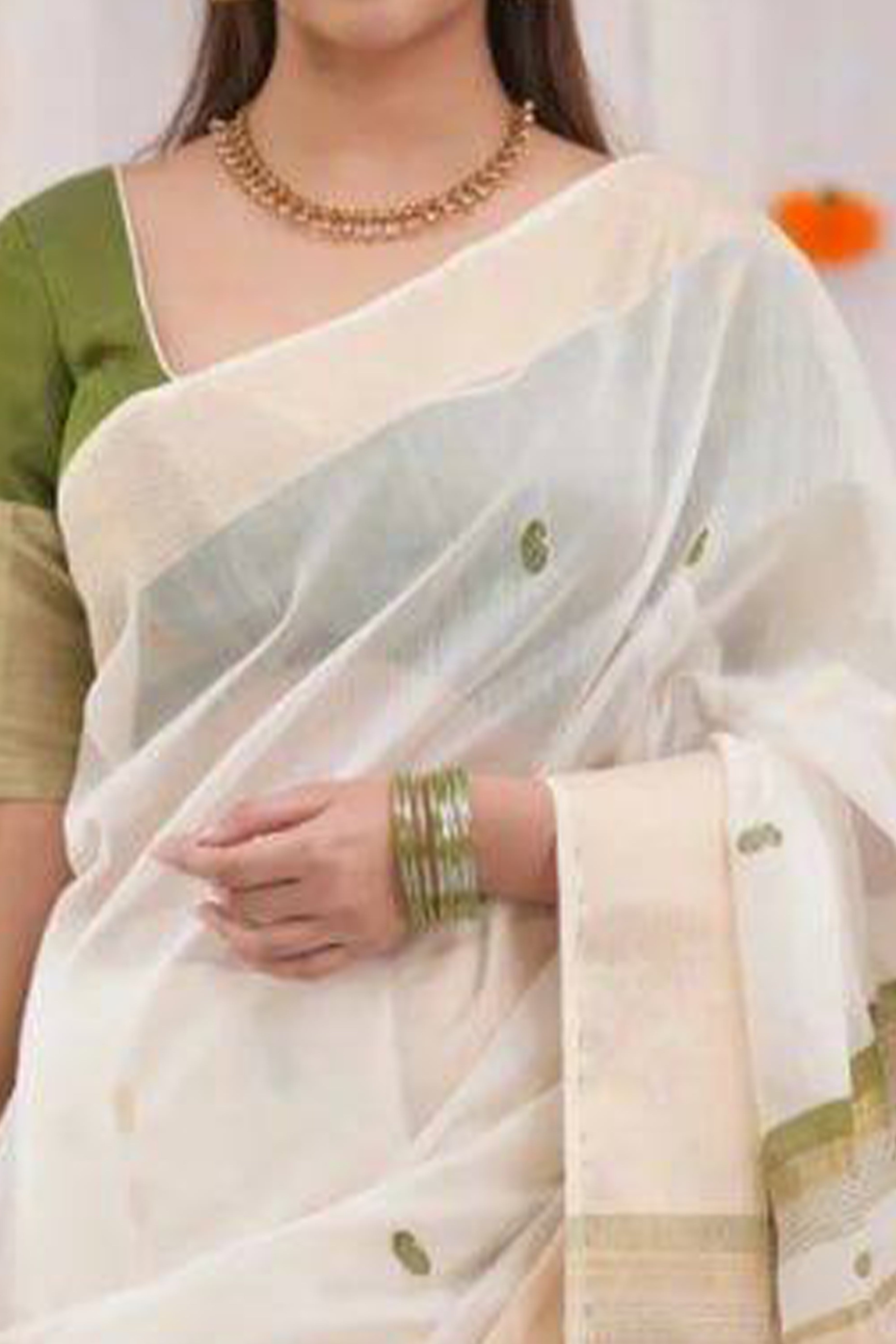 White and Green Zari-Woven Linen Cotton Saree Offering a Refined Festive Look