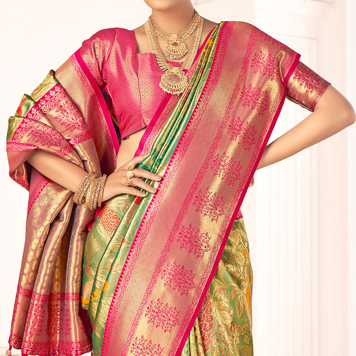 Green Woven Pure Silk Saree With Tassels