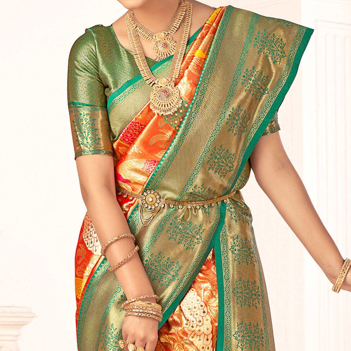 Orange Woven Pure Silk Saree With Tassels