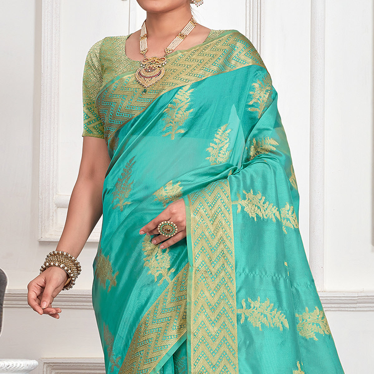 Turquoise Floral Woven Organza Saree