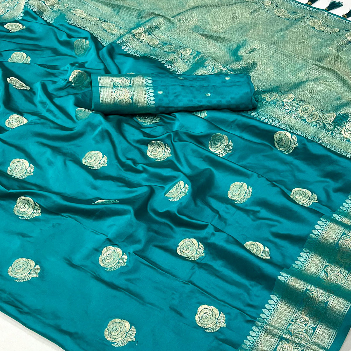 Rama Green Floral Woven Satin Silk Saree With Tassels