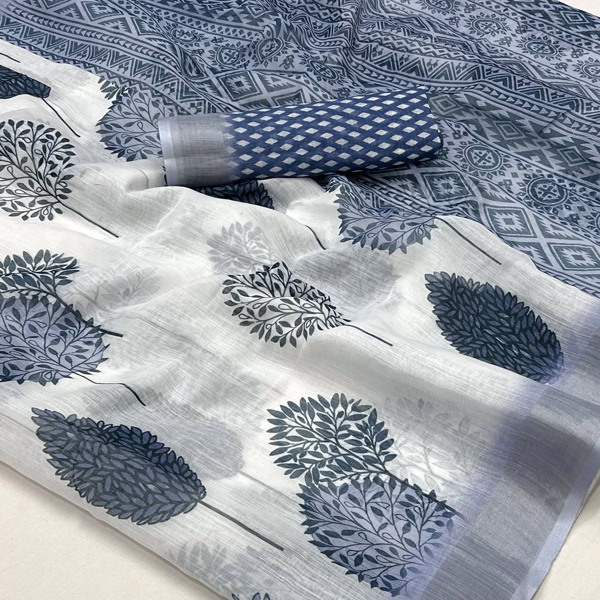 White & Blue Floral Digital Printed Linen Saree With Zari Border