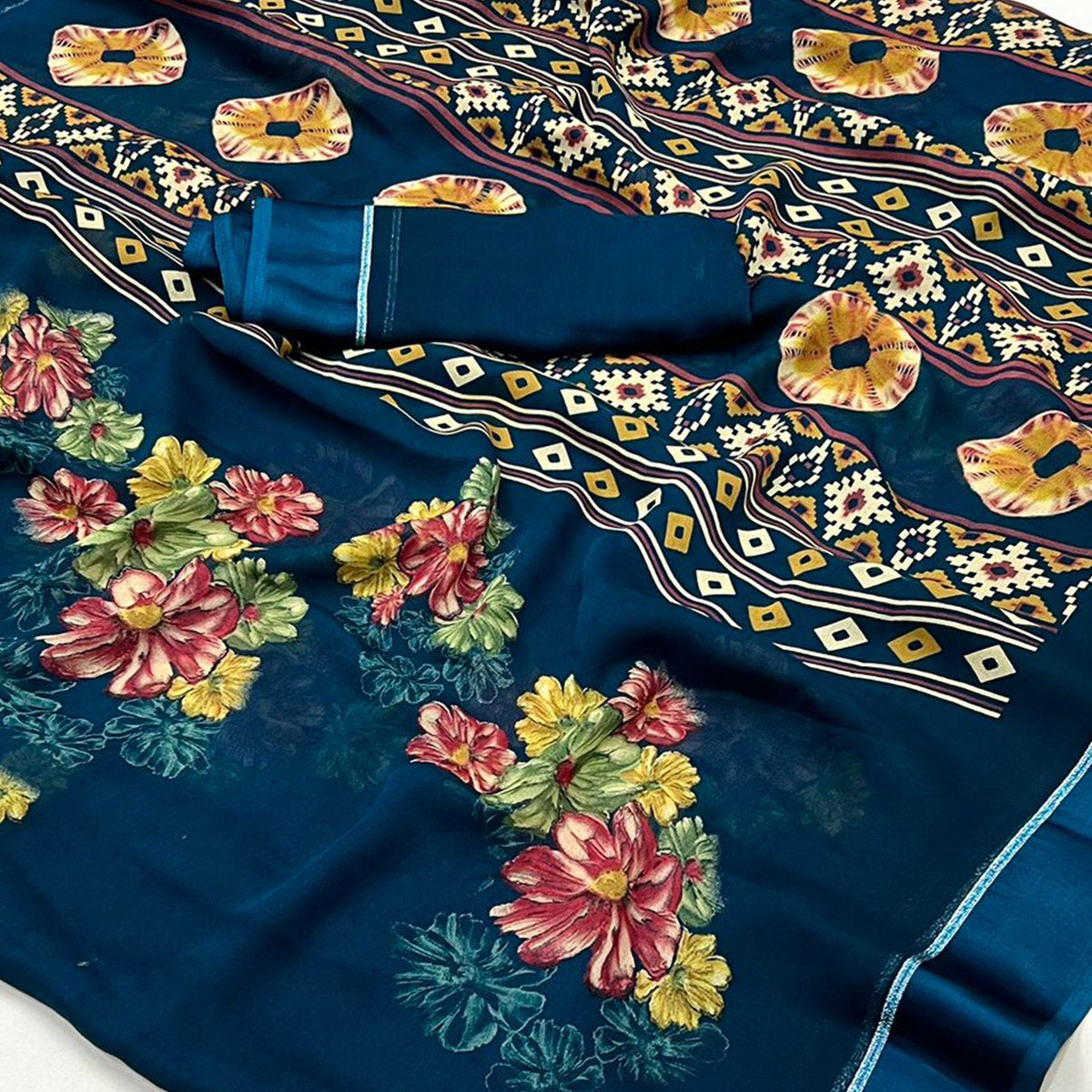 Blue Floral Printed Georgette Saree With Fancy Zari Border