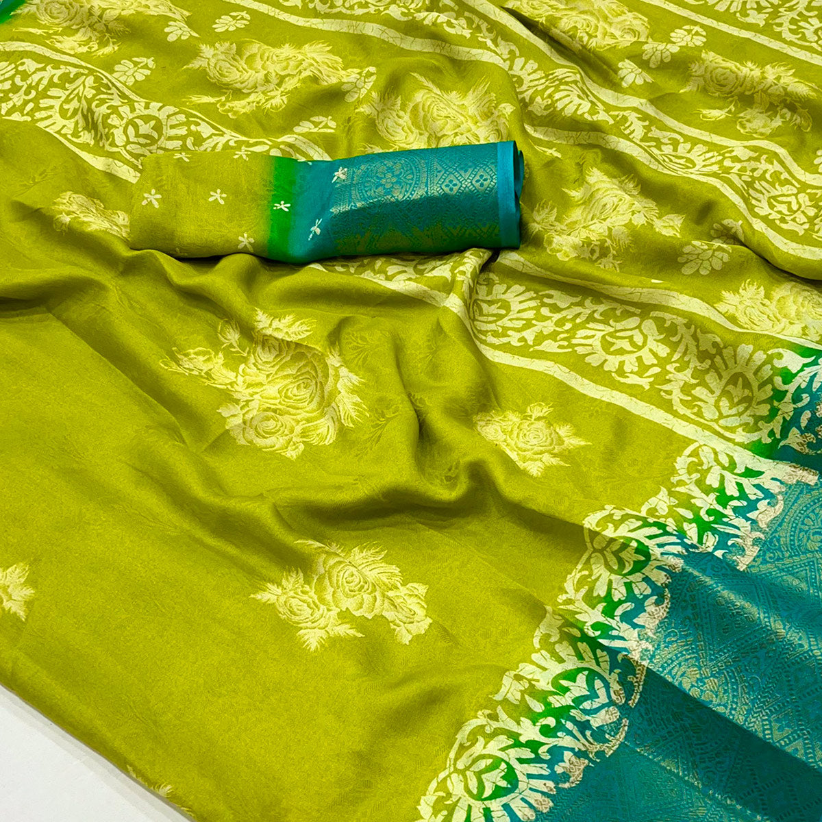 Green Floral Printed Georgette Saree With Fancy Jacquard Zari Border