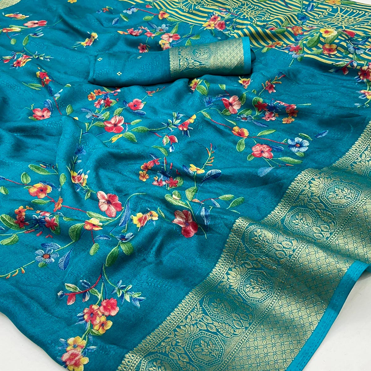 Blue Floral Printed Georgette Saree With Woven Border