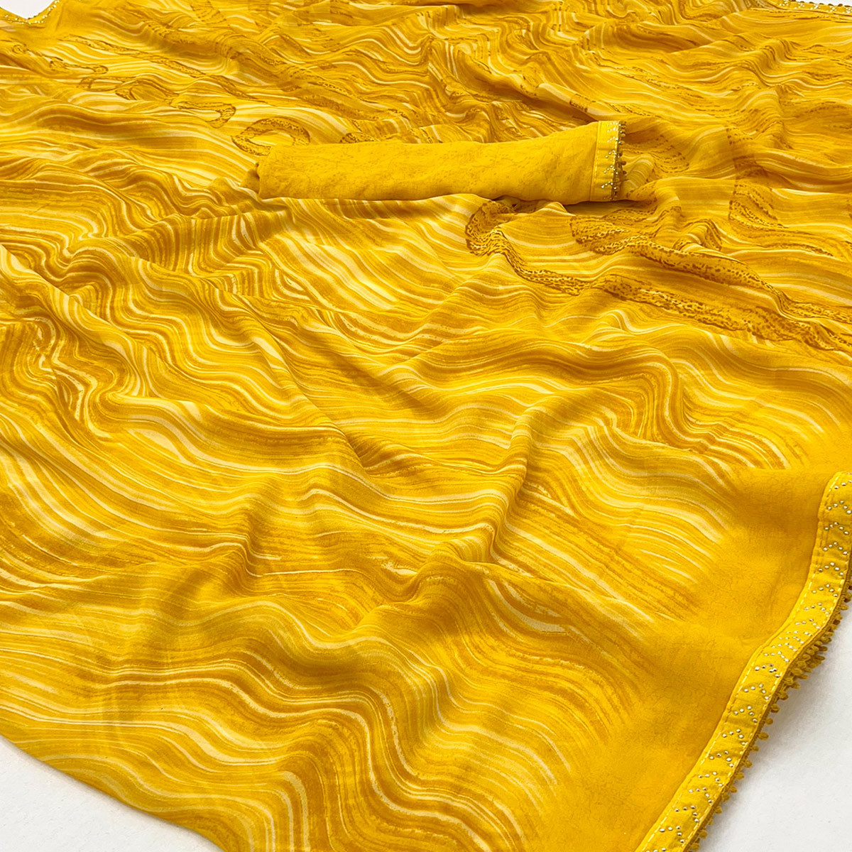 Mustard Printed Georgette Saree With Fancy Lace Border