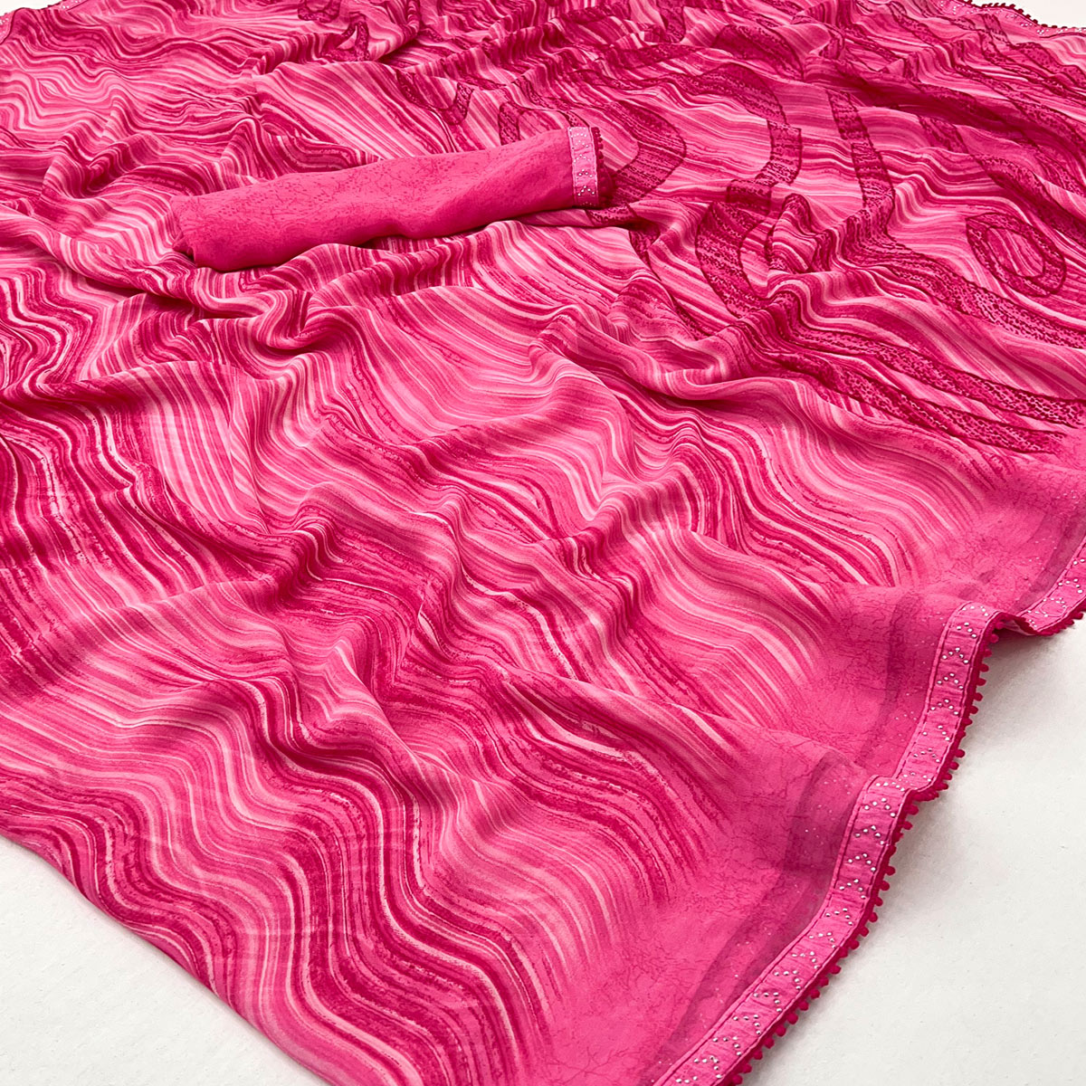 Pink Printed Georgette Saree With Fancy Lace Border