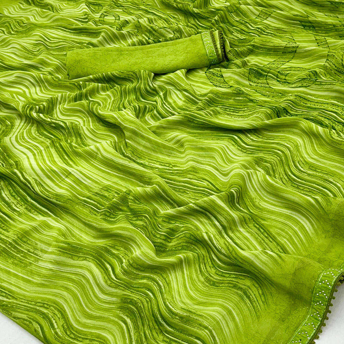 Green Printed Georgette Saree With Fancy Lace Border
