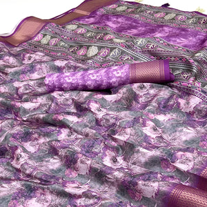 Purple Elegance In Dola Saree Featuring Blooming Digital Prints & Zari Border & Tassel Pallu
