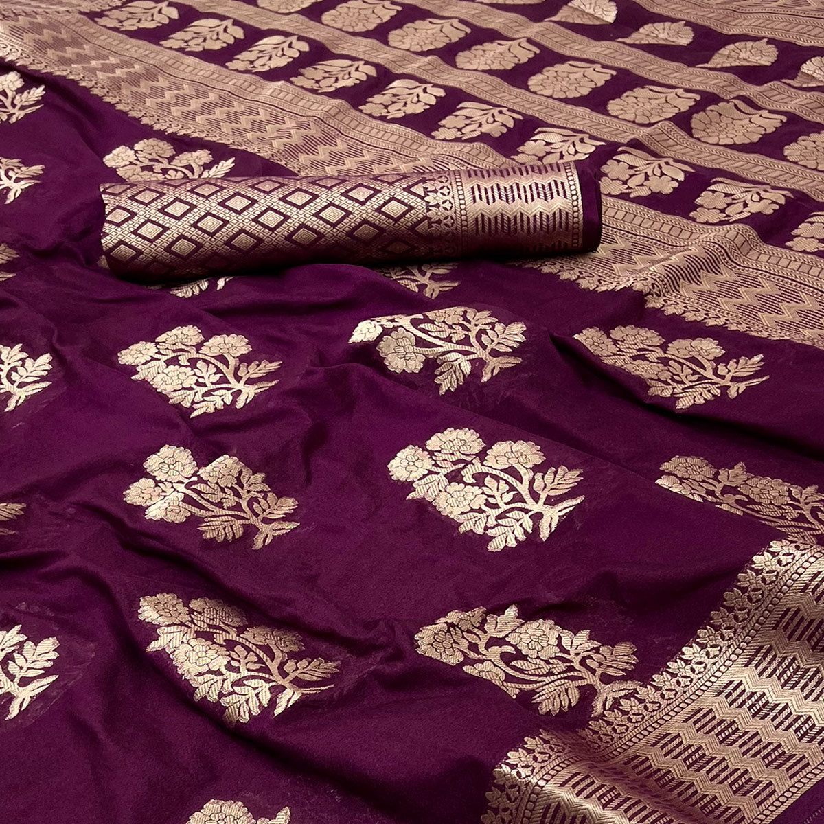 Wine Crepe Silk Saree With Floral Zari Weaving & Stylish Tassel Pallu