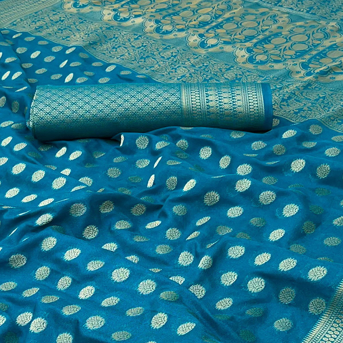 Teal Blue Floral Zari Woven Crepe Silk Saree Accented With Tassel Pallu