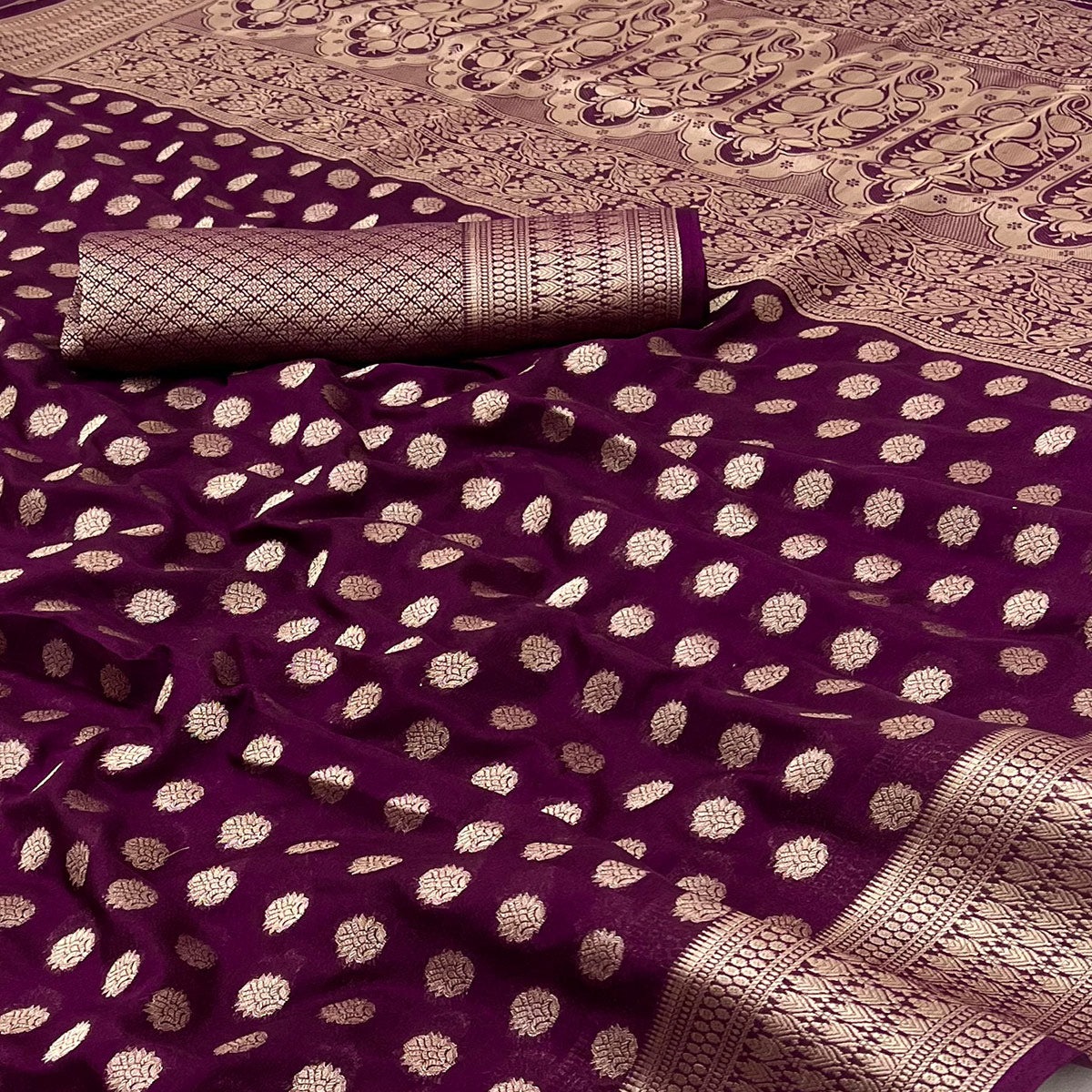 Wine Floral Zari Woven Crepe Silk Saree Accented With Tassel Pallu