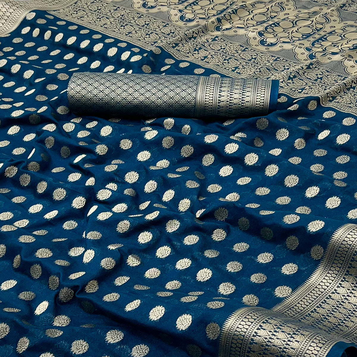 Dark Teal Blue Floral Zari Woven Crepe Silk Saree Accented With Tassel Pallu