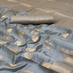 Grey Tusser Cotton Silk Saree Adorned With Floral Zari Weave & Tassel Pallu