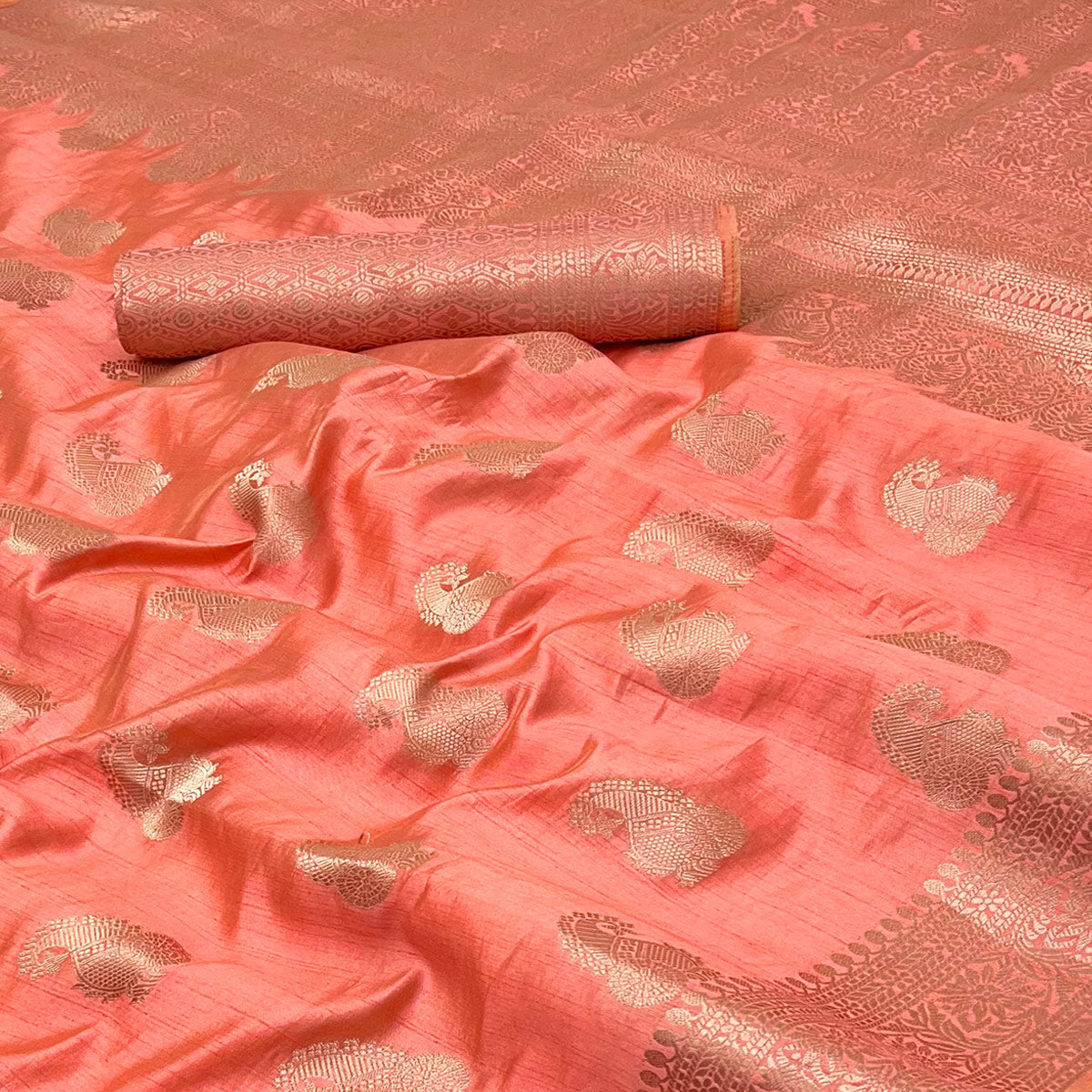 Coral Pink Tusser Cotton Silk Saree Adorned With Floral Zari Weave & Tassel Pallu