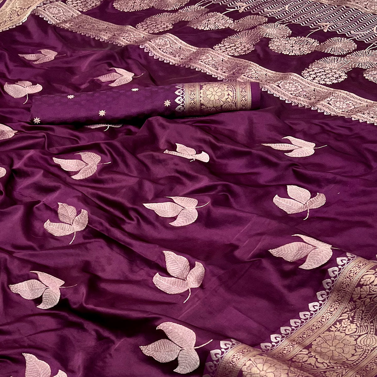 Wine Floral Zari Woven Satin Silk Saree With Graceful Tassel Pallu