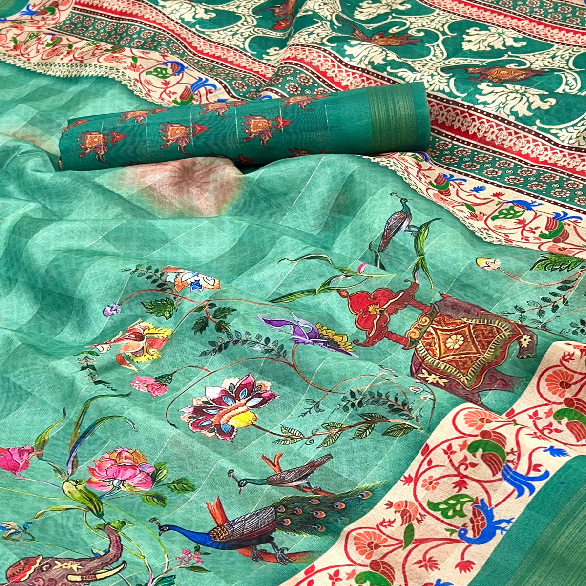 Rama Green Cotton Blend Saree Highlighted With Animal & Floral Digital
