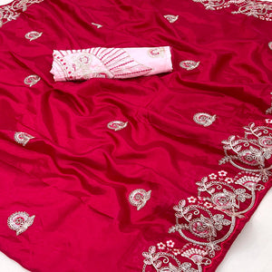 Rani Pink Embroidered Satin Saree with Smooth Texture and Graceful Festive Appeal
