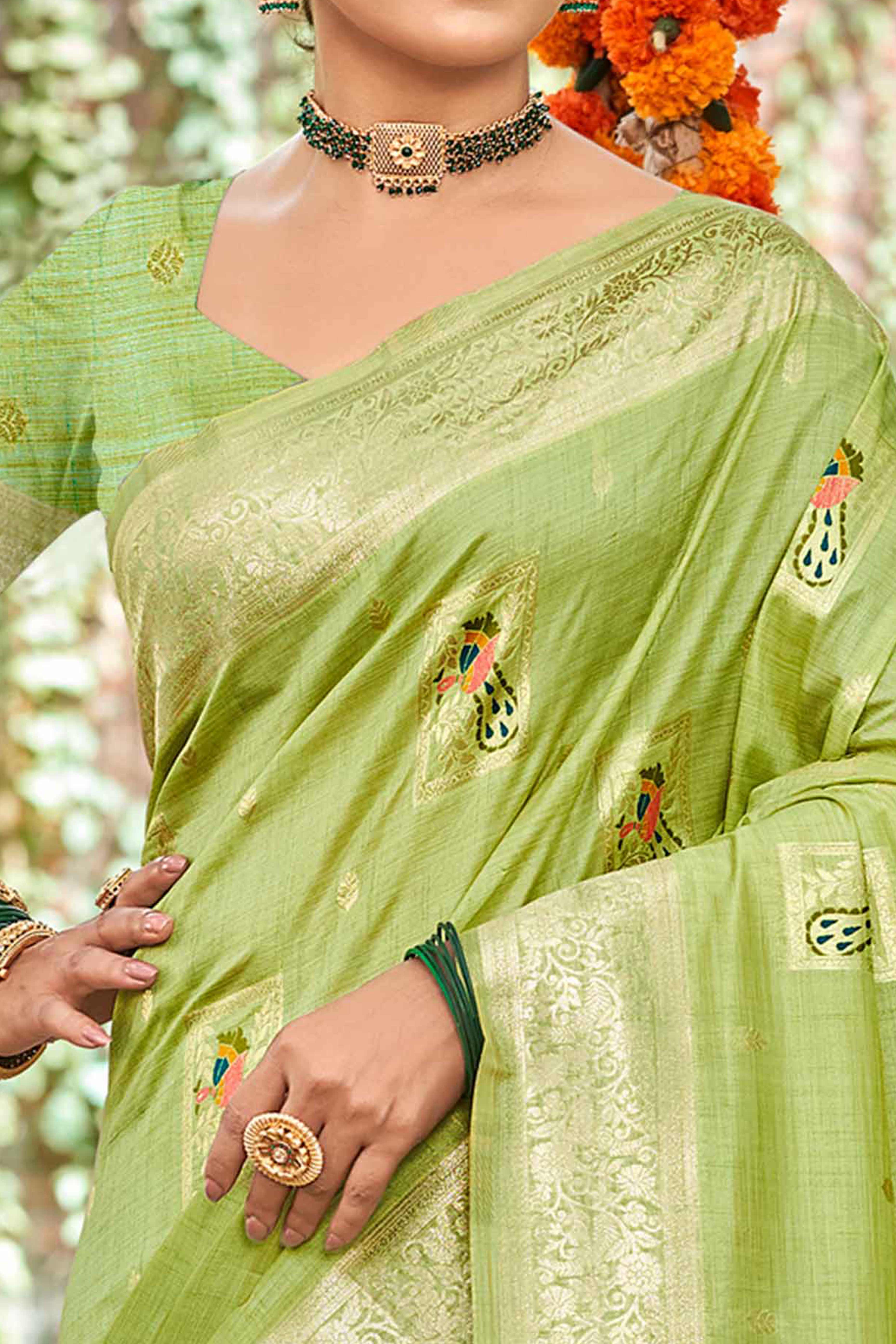 Green Floral & Peacock Motif Zari Woven Assam Silk Blend Saree With Graceful Tassel Pallu