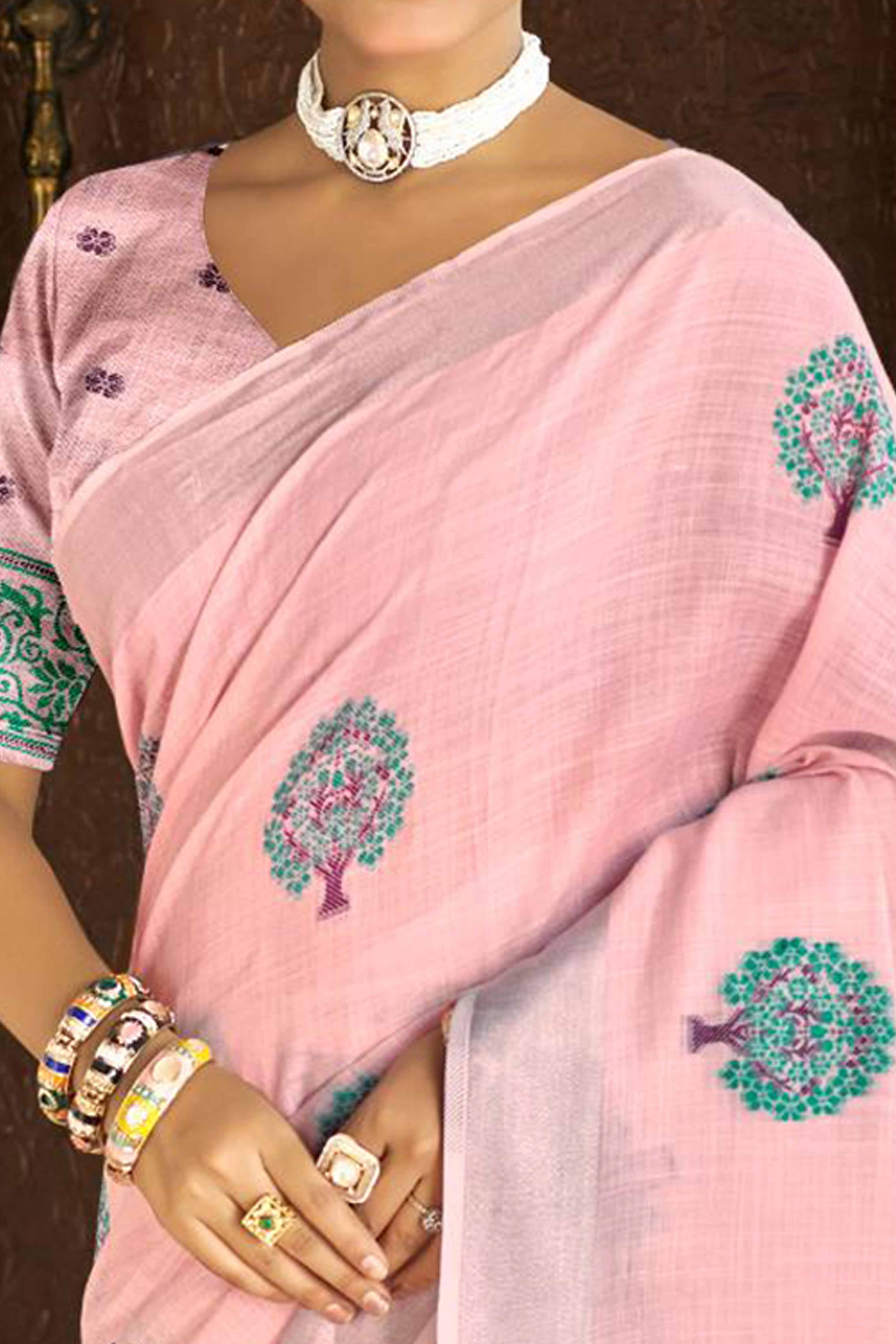 Pink Linen Saree Adorned With Intricate Zari Weaving & Tassel Pallu