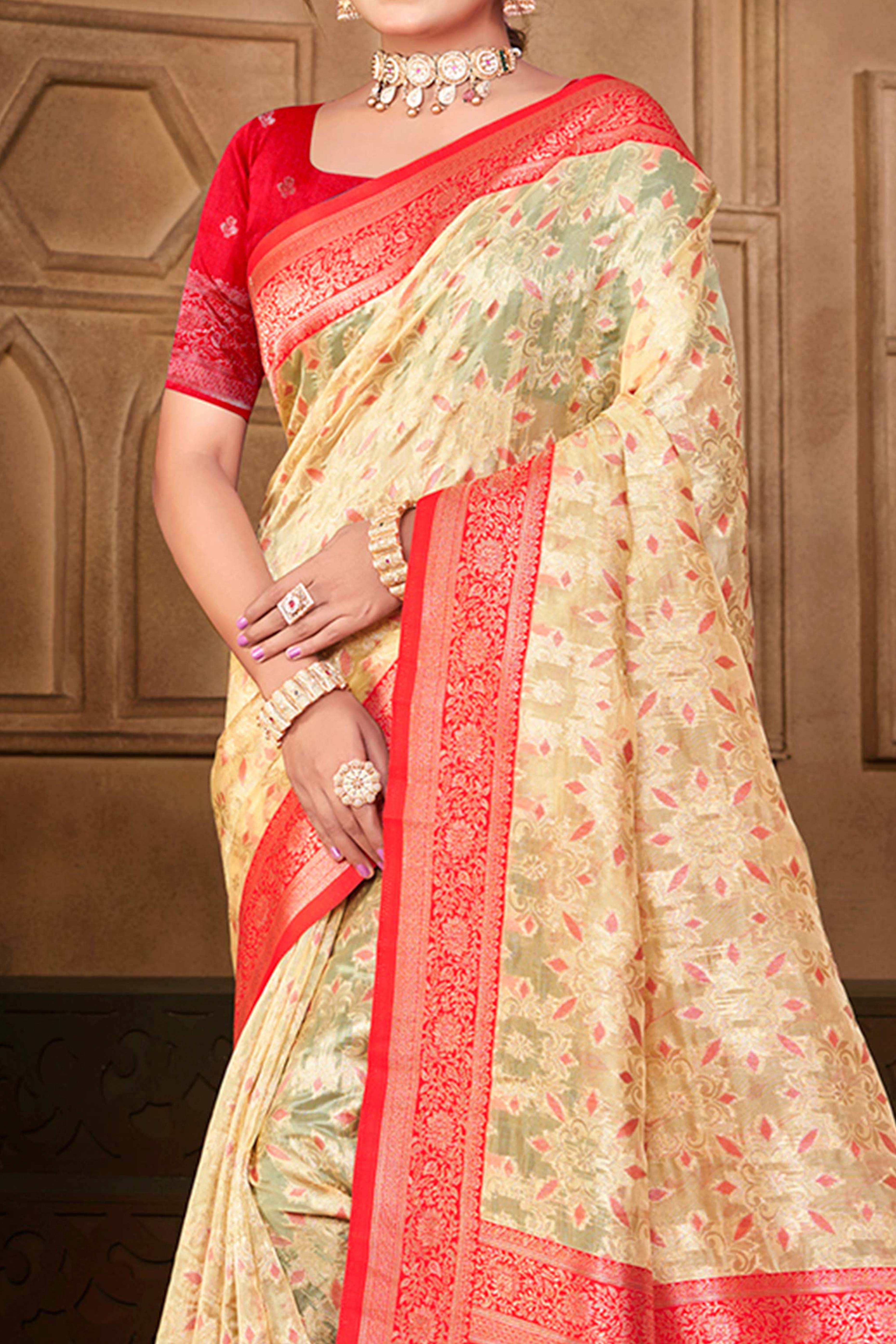 Stunning Cream & Pink Floral Weaving Silk Blend Saree Enhanced With A Stylish Tassel Pallu