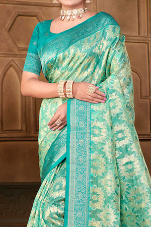 Stunning Turquoise Blue Floral Weaving Silk Blend Saree Enhanced With A Stylish Tassel Pallu