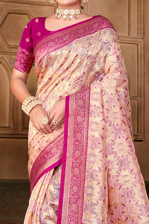 Stunning Pastel Magenta Floral Weaving Silk Blend Saree Enhanced With A Stylish Tassel Pallu
