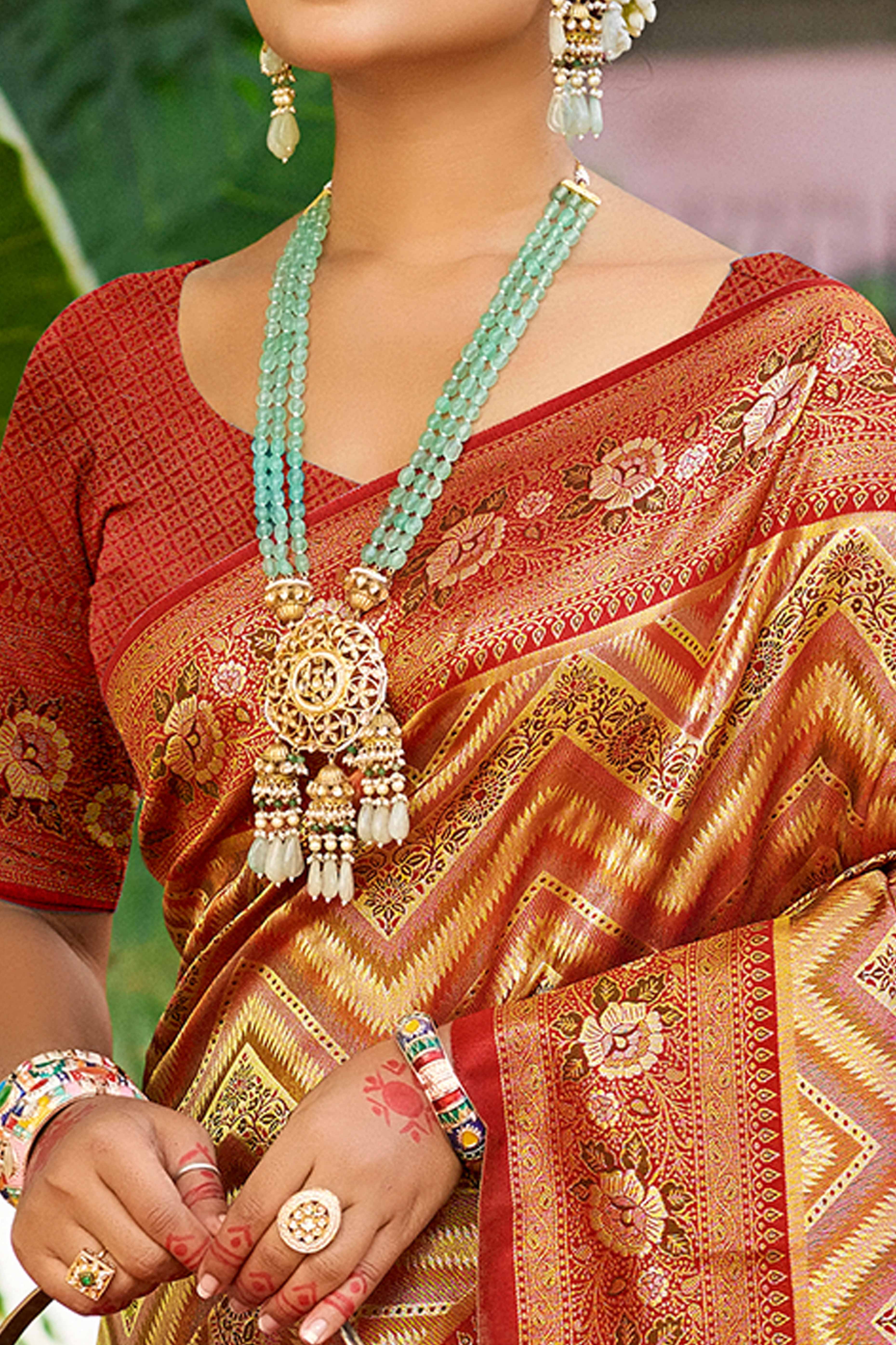 Maroon Silk Blend Dharmavaram Saree Featuring Floral & Zig Zag Woven Patterns With Tassel Finish