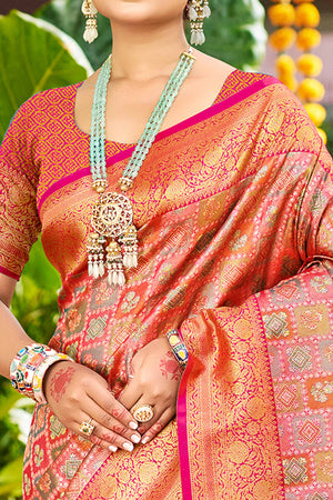 Pink Silk Blend Dharmavaram Saree Featuring Ornate Floral Weaves & Tassels Pallu