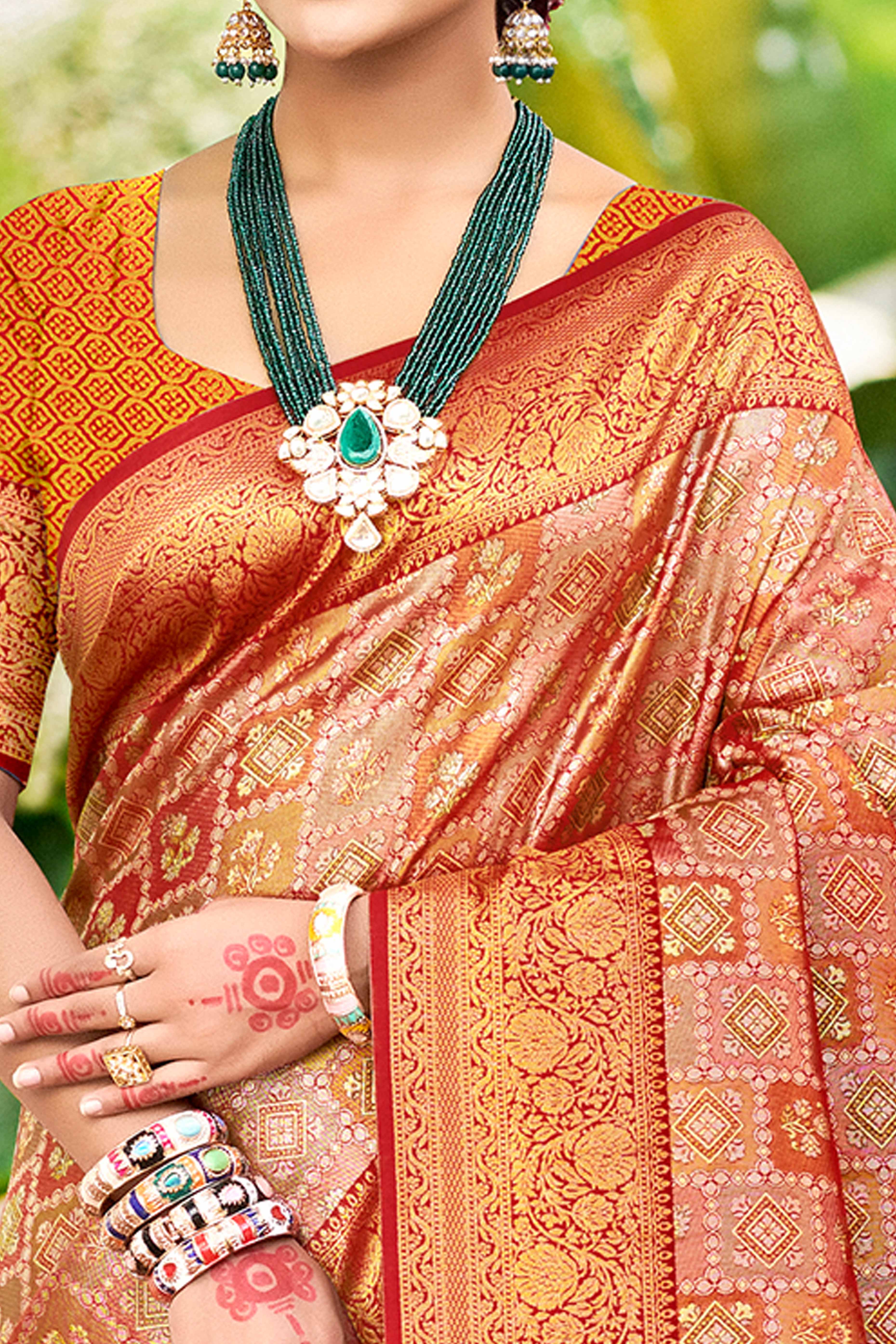 Red Silk Blend Dharmavaram Saree Featuring Ornate Floral Weaves & Tassels Pallu