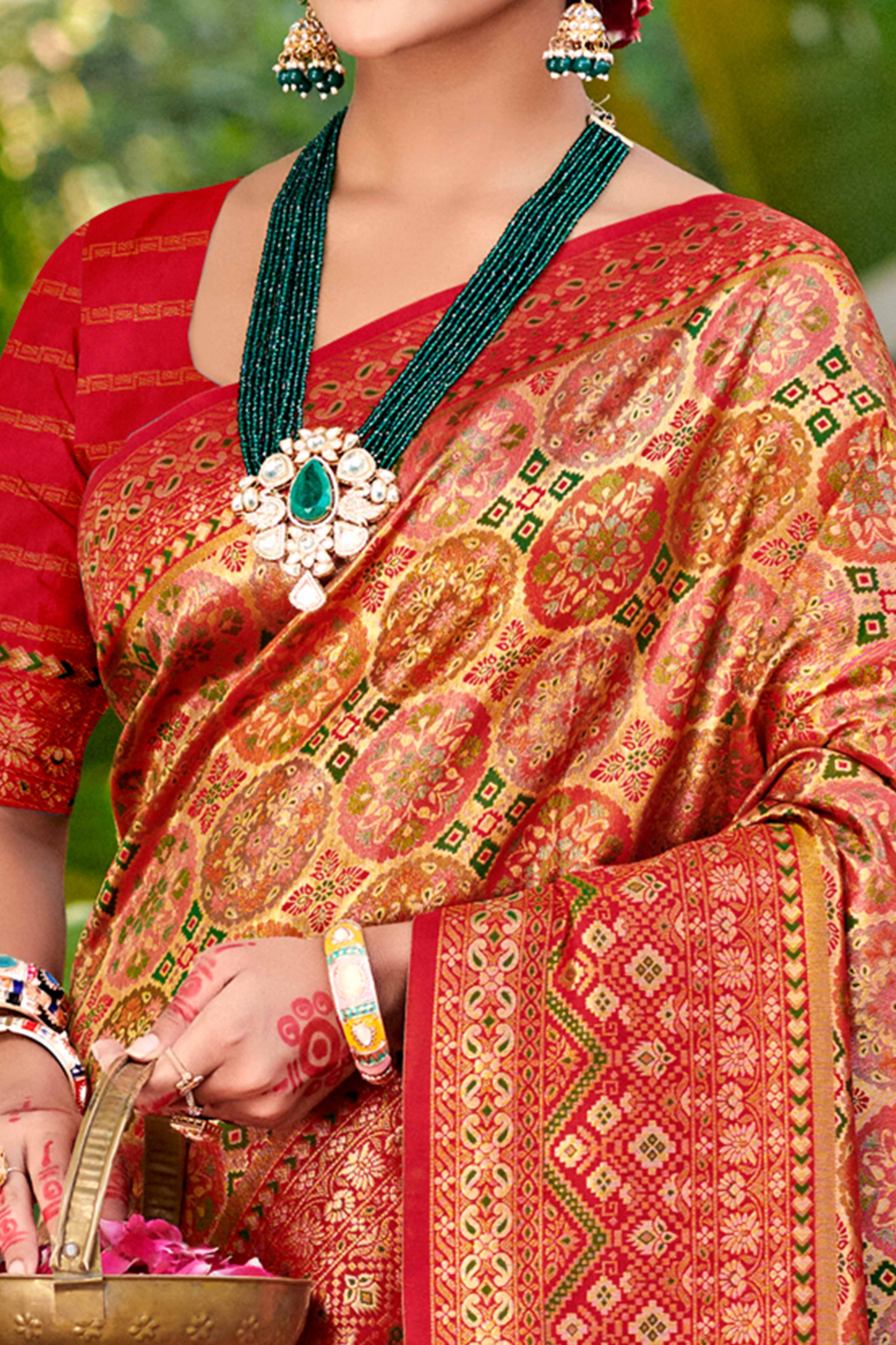 Floral Patterned Golden & Red Woven Silk Blend Dharmavaram Saree With Tassel Elegance