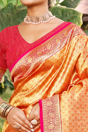 Orange Paithani Saree In Kanjivaram Silk Adorned With Intricate Floral Weaving