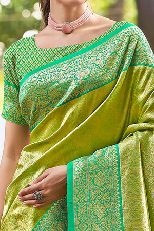 Green Paithani Saree In Kanjivaram Silk Featuring Floral Woven Motifs & Tassel Pallu
