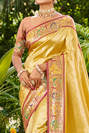 Graceful Yellow Silk Blend Saree Adorned With Intricate Zari Weave & Peacock Motif Pallu
