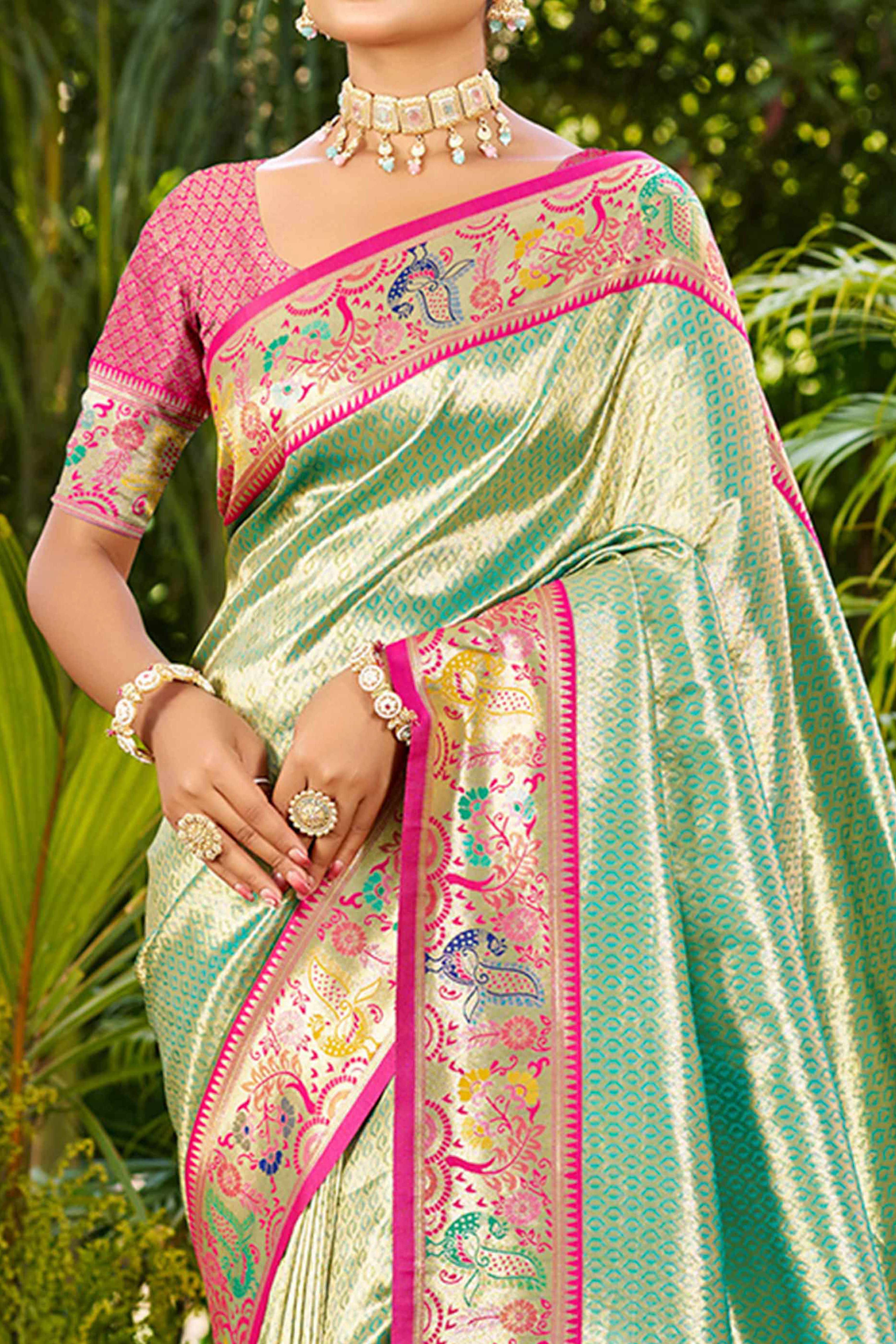 Graceful Turquoise Silk Blend Saree Adorned With Intricate Zari Weave & Peacock Motif Pallu