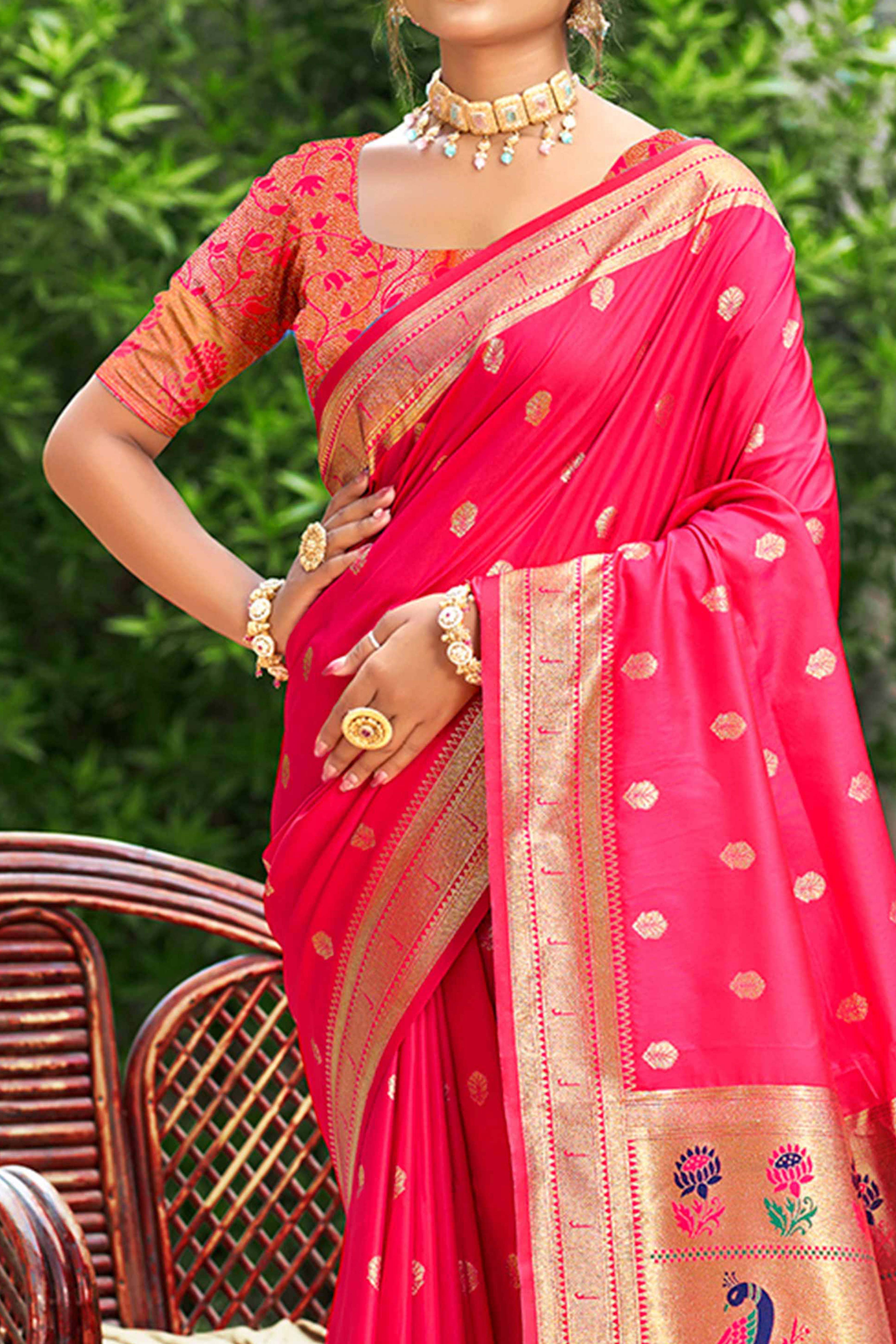 Rani Pink Zari Weaving Silk Blend Saree Adorned With Intricate Peacock Motif Pallu & Graceful Tassel