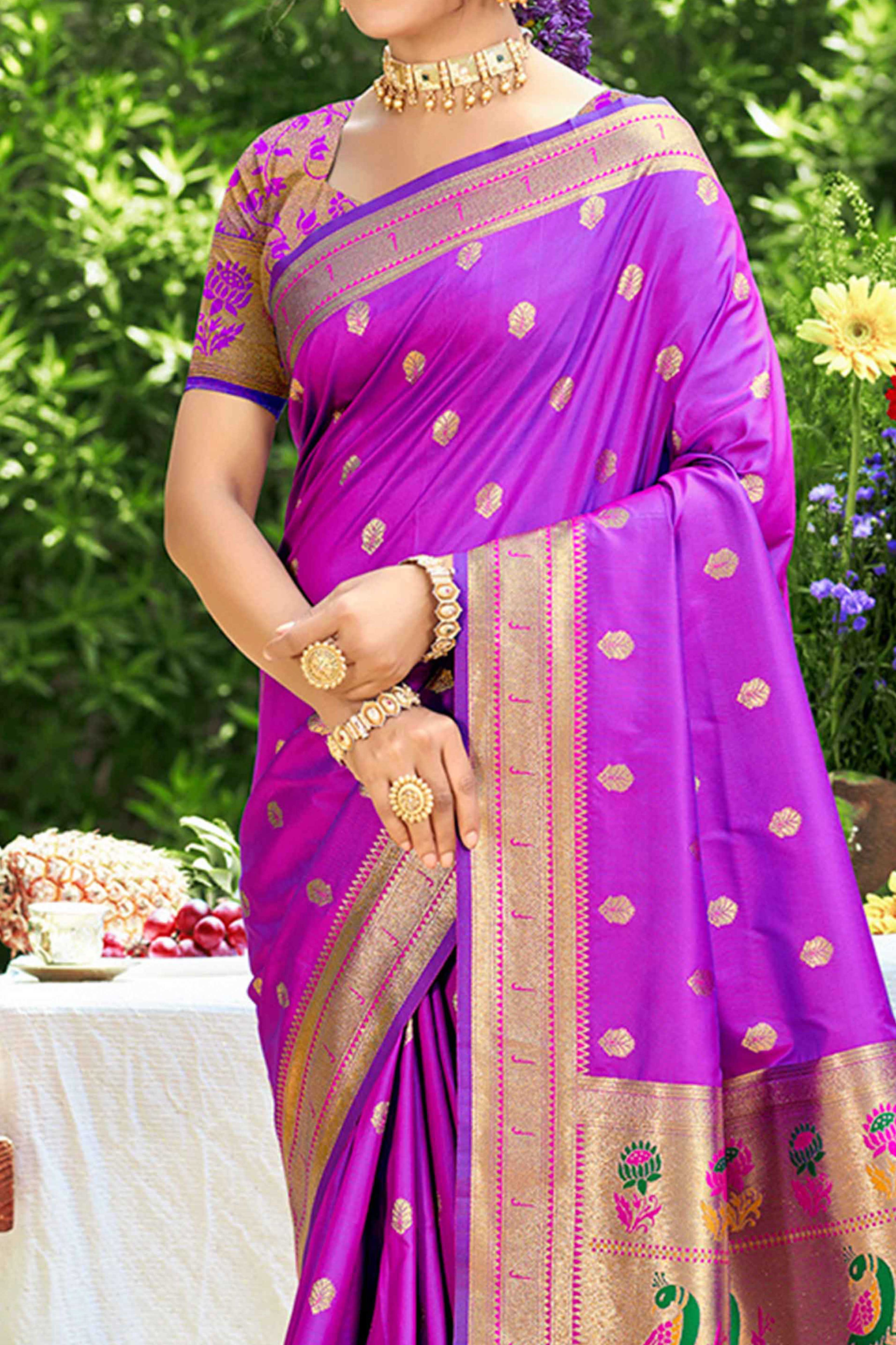 Purple Zari Weaving Silk Blend Saree Adorned With Intricate Peacock Motif Pallu & Graceful Tassel