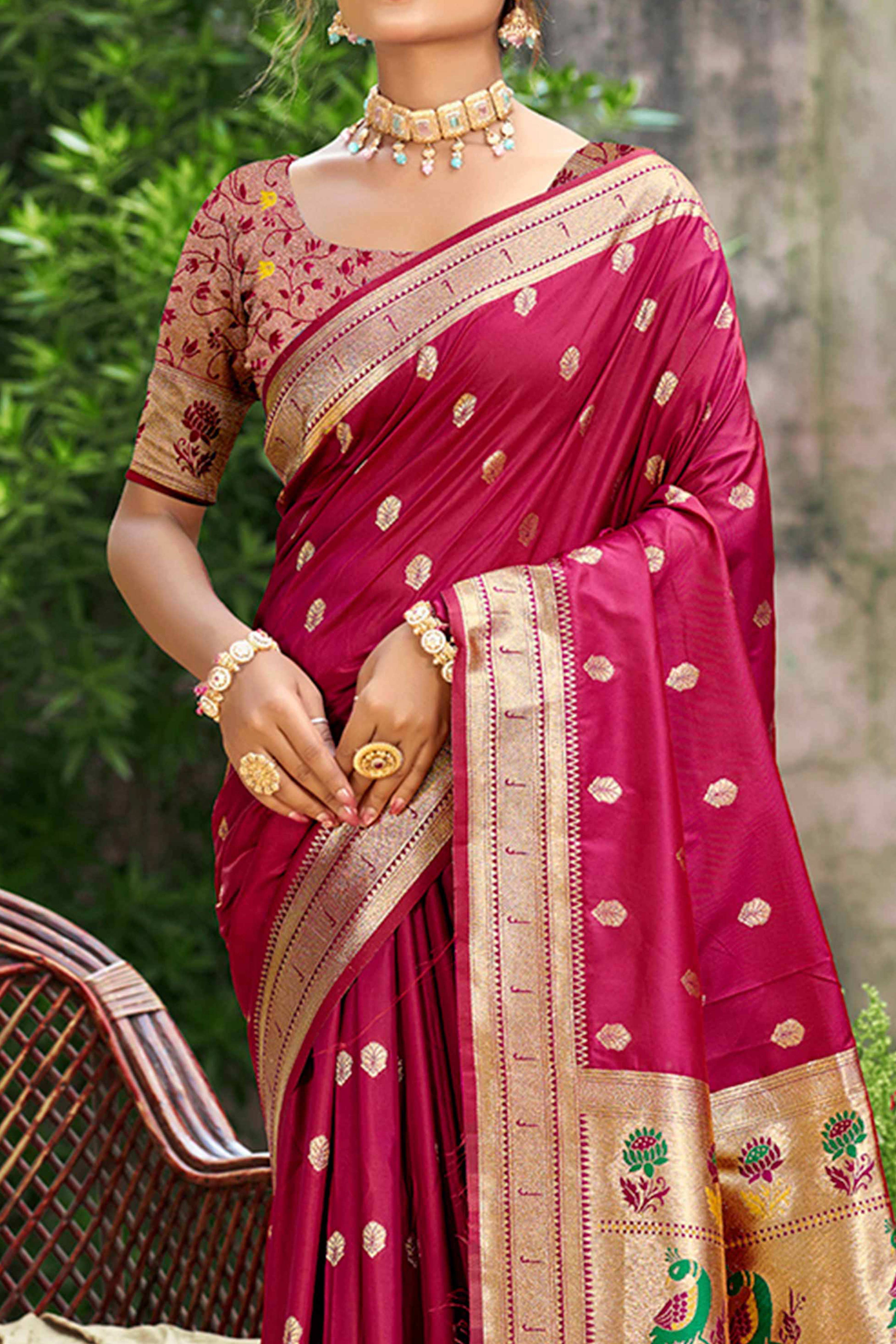 Deep Magenta Zari Weaving Silk Blend Saree Adorned With Peacock Motif Pallu & Graceful Tassel