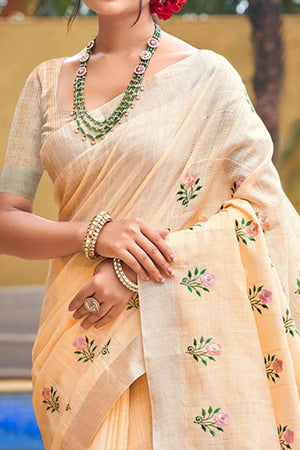 Captivating Light Peach Floral Thread Embroidered Linen Saree With Elegant Weaving Border
