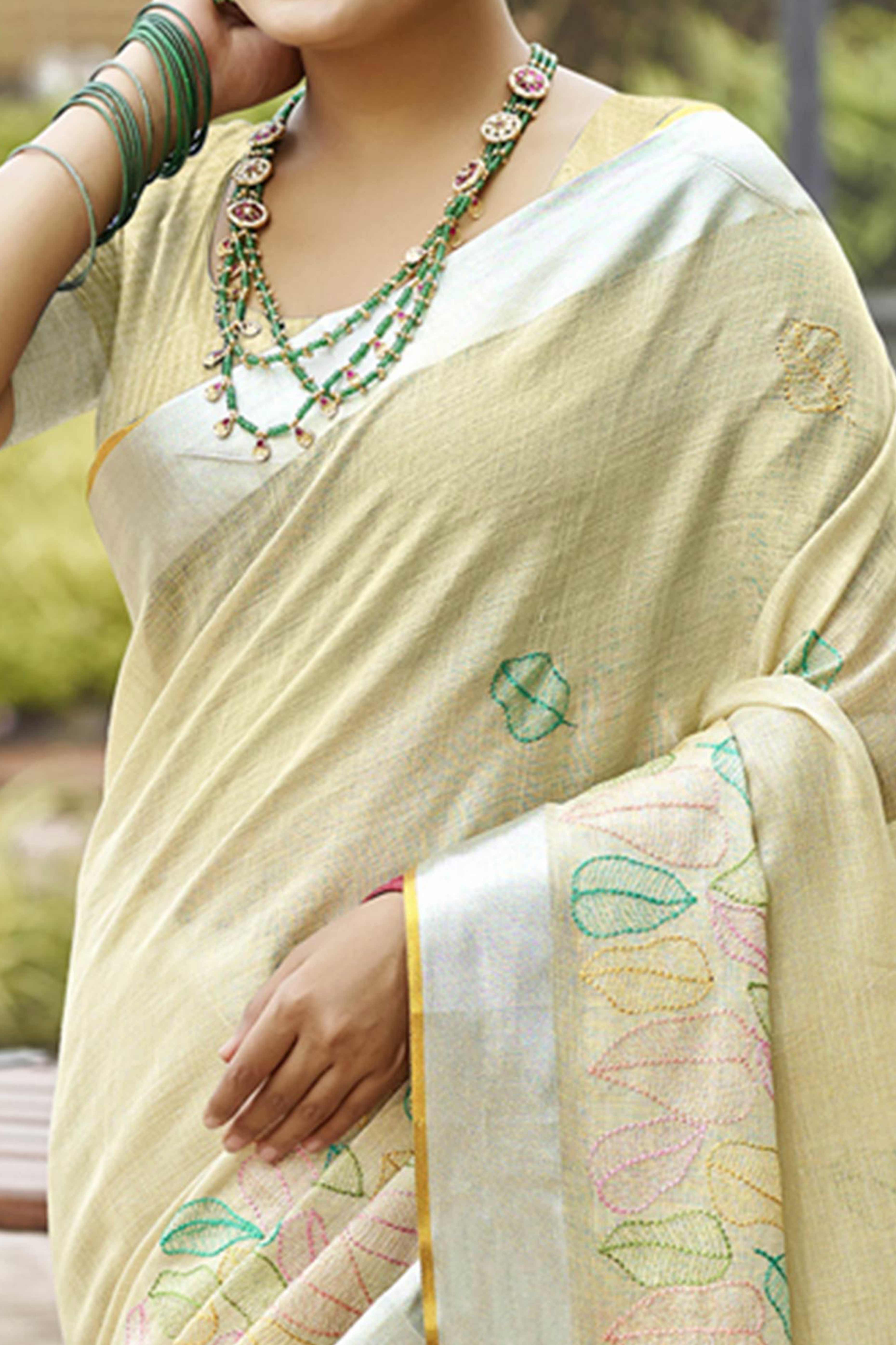 Classic Pista Green Leaf Pattern Thread Embroidery Work Linen Saree With Tassel Pallu