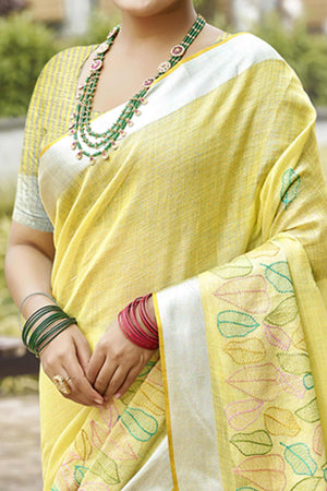 Classic Yellow Leaf Pattern Thread Embroidery Work Linen Saree With Tassel Pallu